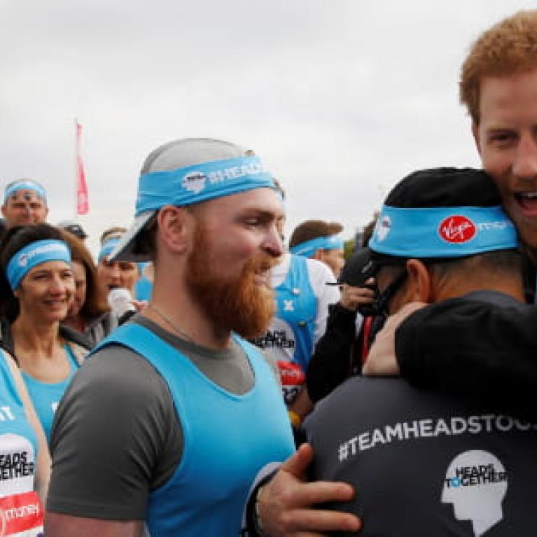 Duke of Sussex hugs a participant